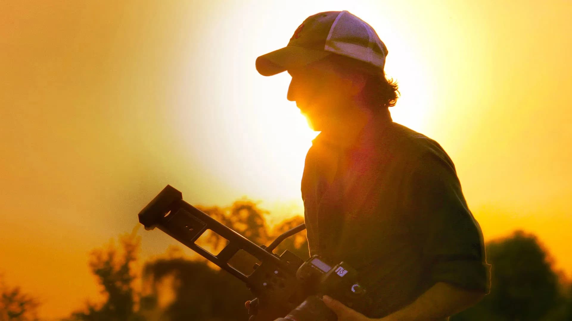 Backdrop for Armed Only with a Camera: The Life and Death of Brent Renaud